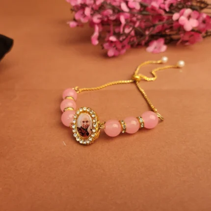 Pink Round Pearl Bracelet with Jai Guruji Swaroop Handmade Bracelets